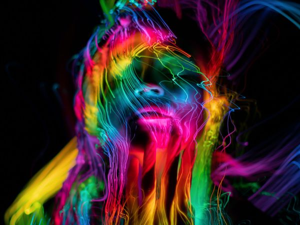 Rainbow light waves over a human face. Can addictions be removed with sound - Binaural Beats? naan design, naandesign